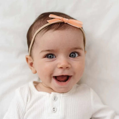 Snuggle Hunny Velvet Bow Stretchy Headband - Coral